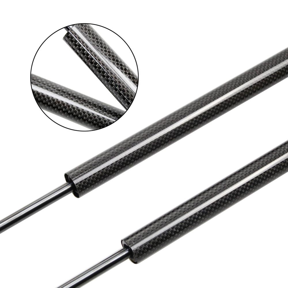 Voor mitsubishi pajero sportwagen styling auto motorkap motorkap aanpassen gasveren lift ondersteuning schokdemper: Zwarte koolstofvezel