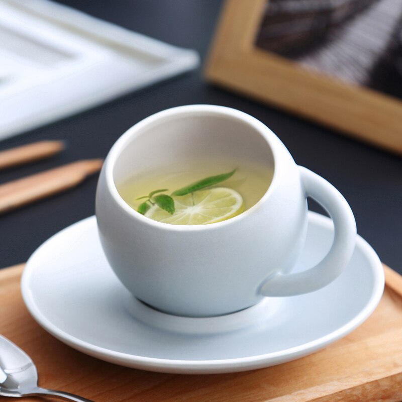 Taza de café esférica y platillos de cerámica para el hogar, tazas de té de porcelana de Color sólido mate hechas a mano, de para beber en el hogar