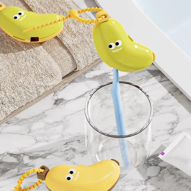 Bonita cubierta protectora para cabezal de cepillo de dientes en forma de plátano con compartimento para pasta de dientes, caja de almacenamiento portátil con abrazadera para polvo de viaje