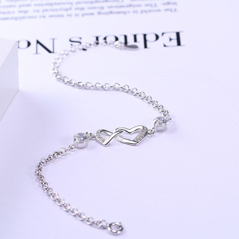 Doppio bracciale a forma di cuore con temperamento femminile del braccialetto in argento puro s925 che vende gioielli a contratto