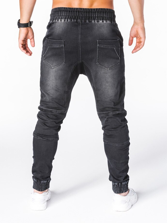 Höstens europeiska och amerikanska tvättade denimtyg för män sportbyxor och benvärmande jeans