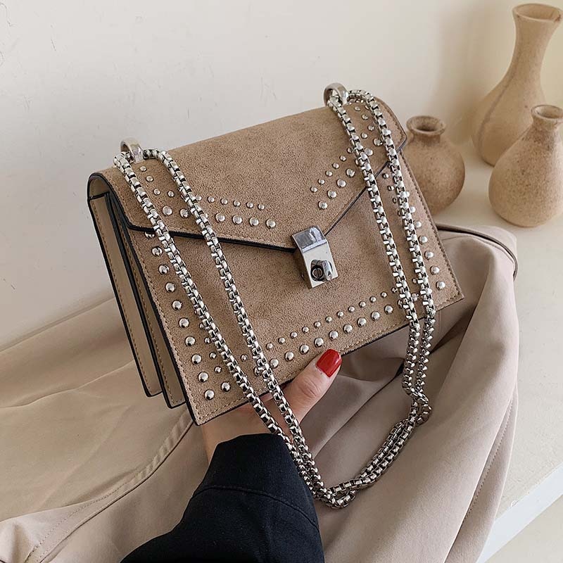 Kleine leren schoudertassen voor dames met ketting en klinknagelsluiting, crossbodytas voor dames, mini-reistassen