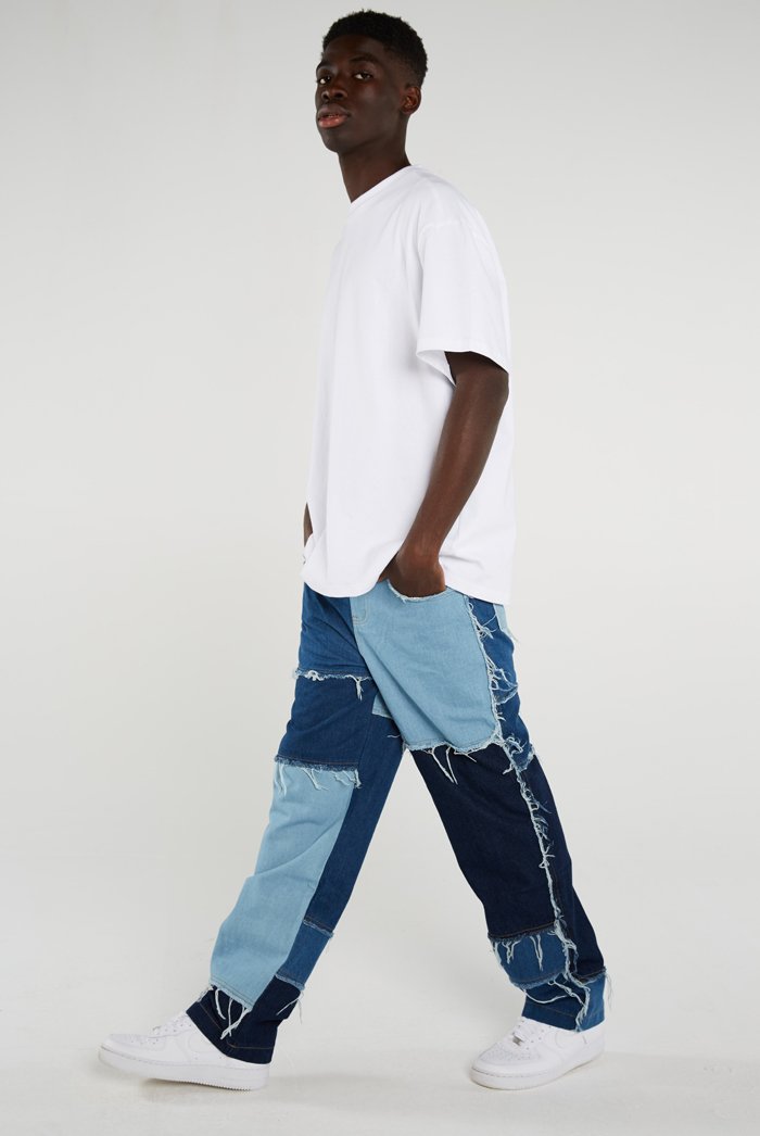 Pantalones vaqueros de pierna recta para hombre, estilo otoño y primavera, deshilachados, con retazos de colores, corte holgado,