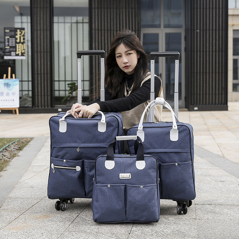 Frauen Wagen Gepäck rollen Koffer Reise Hand binden Stange Anzug lässig rollen fallen Reisetasche Räder Gepäck Koffer