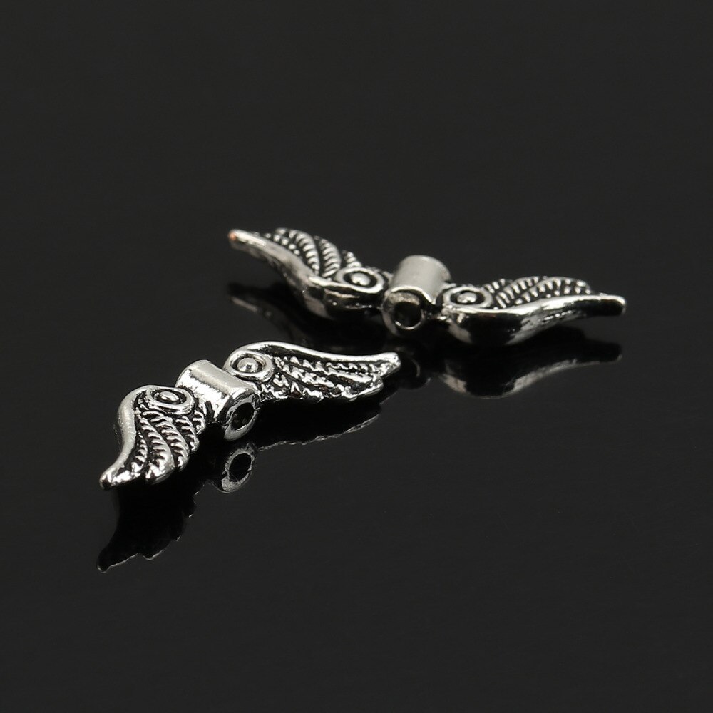 DoreenBeads Retail 50 Silver Color Angel Wing Charm Spacers Beads 23x7mm