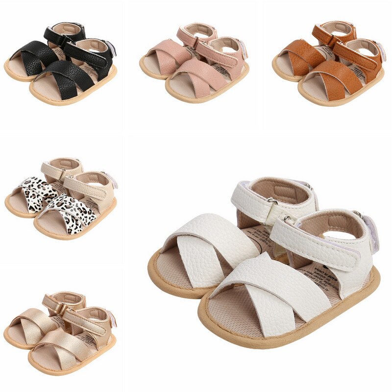Sandalias de cuero para bebés, niños y niñas, zapatos planos antideslizantes con punta abierta y correa entrecruzada