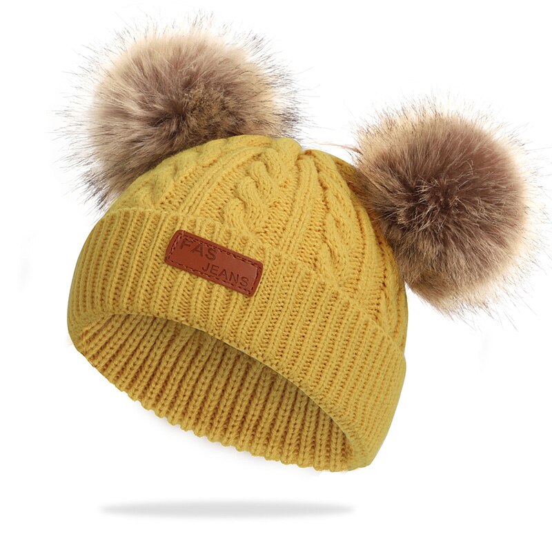 Cute baby child winter cotton hat outdoor leisure hair ball knit hat boy girl label thickening comfortable baby hat: Yellow